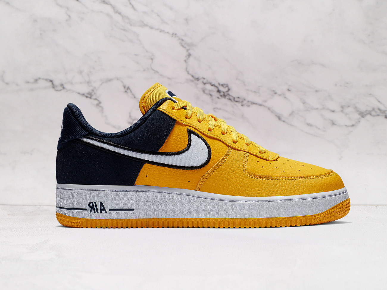 Nike Air Force 1 Low Amarillo with Obsidian navy accents