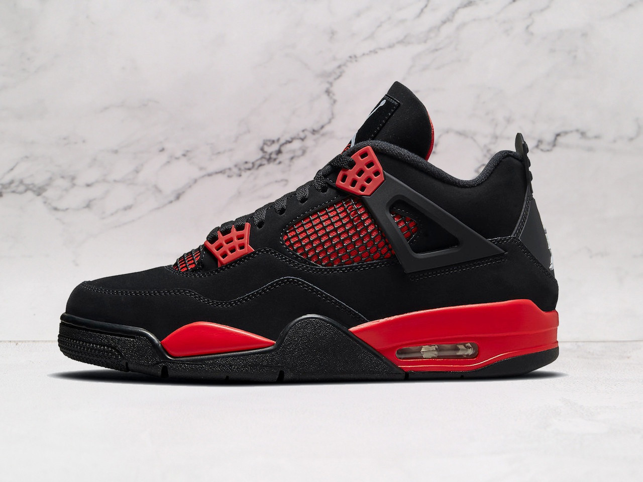 Jordan 4 Retro Red Thunder – Bold Black & Red Sneaker
