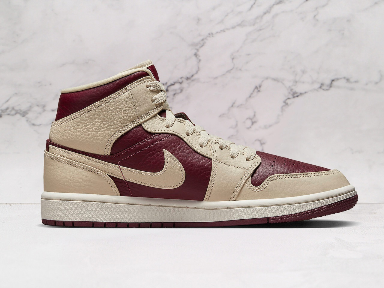 Jordan 1 Mid – Premium Leather & Air Cushioning