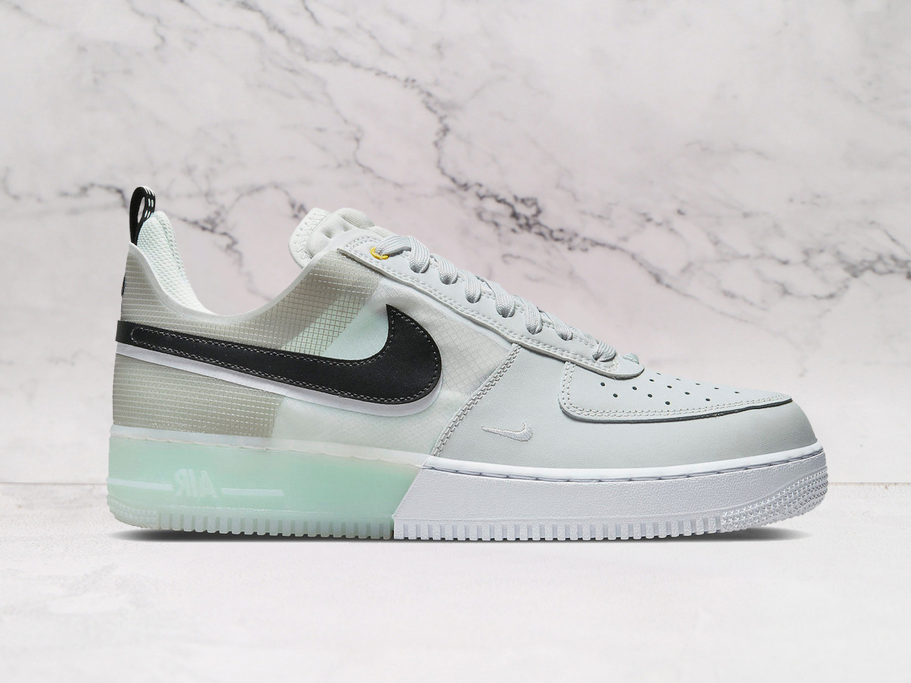 Nike Air Force 1 React Mint Foam with black stacked Swooshes