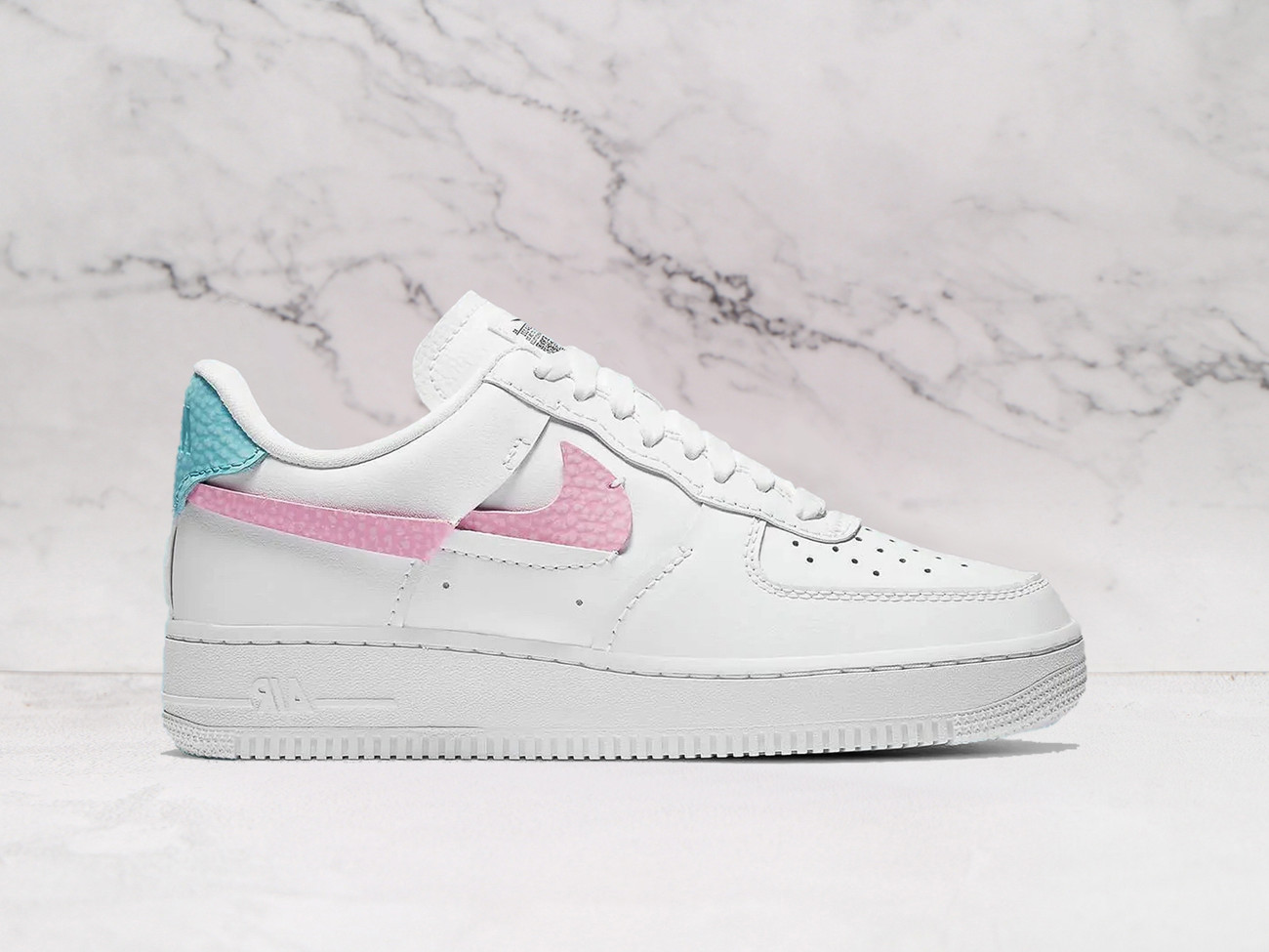 Nike Air Force 1 LXX Vandalized Pink Aqua sneaker with pink Swoosh