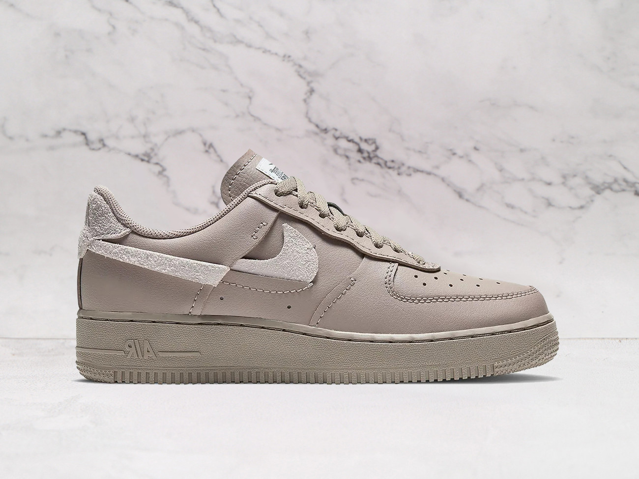 Nike Air Force 1 LXX Vandalized Malt sneaker with split Swoosh