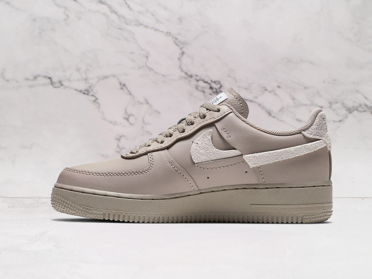 Nike Air Force 1 LXX Vandalized Malt medial view with suede overlays