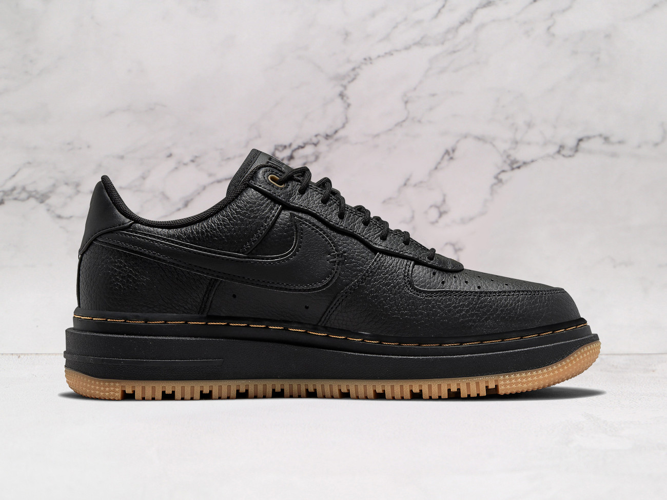 Black Nike Air Force 1 Low Luxe medial view with tonal Swoosh