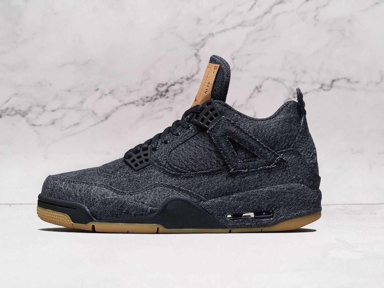 Jordan 4 Retro Levi’s Black – Washed Denim Sneaker