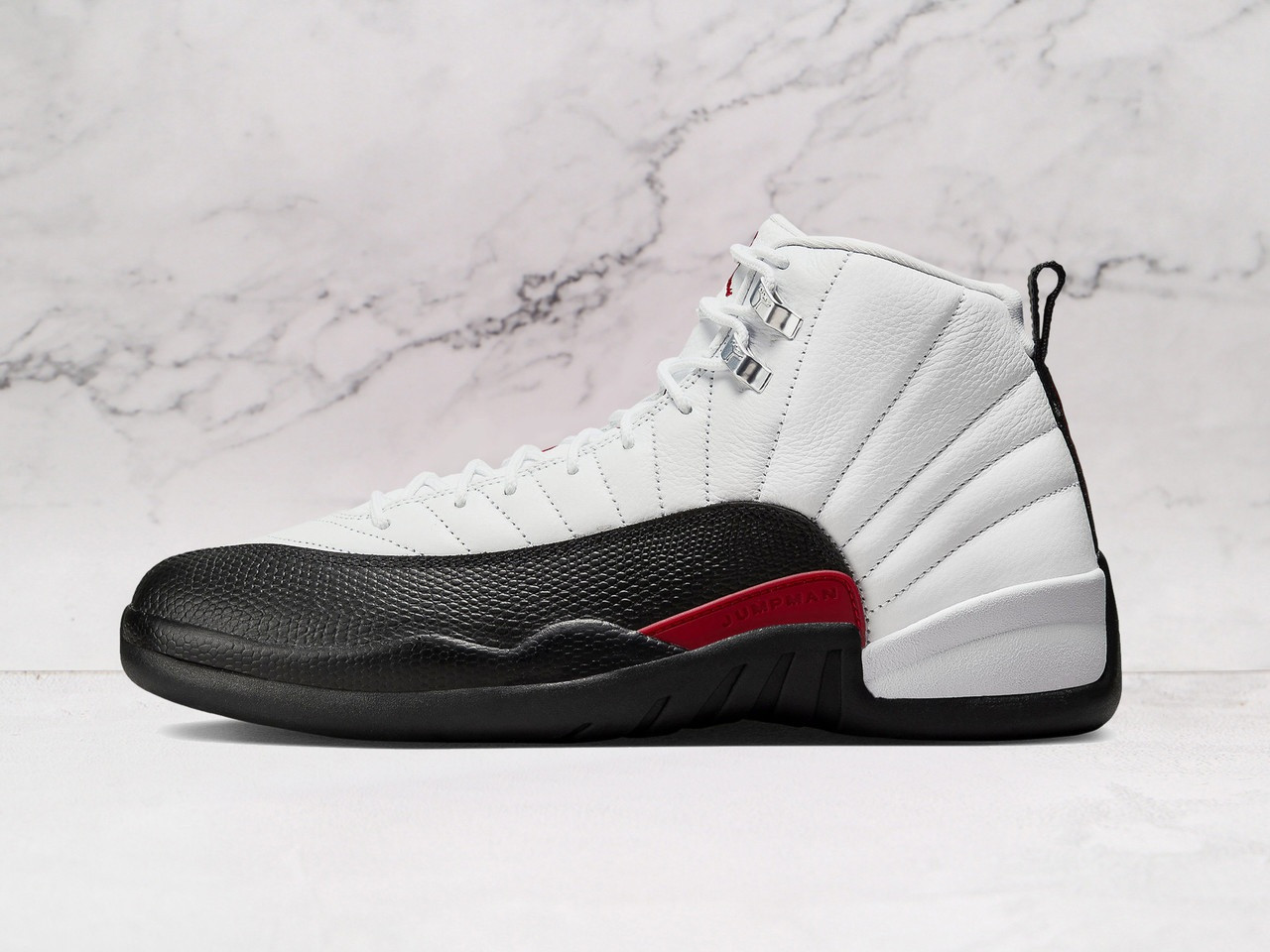 Air Jordan 12 Red Taxi – Side Profile with Bold Red Accents