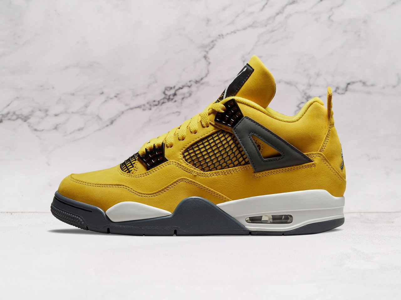 Air Jordan 4 "Lightning" – Black & Yellow Thunder 4s with premium nubuck leather