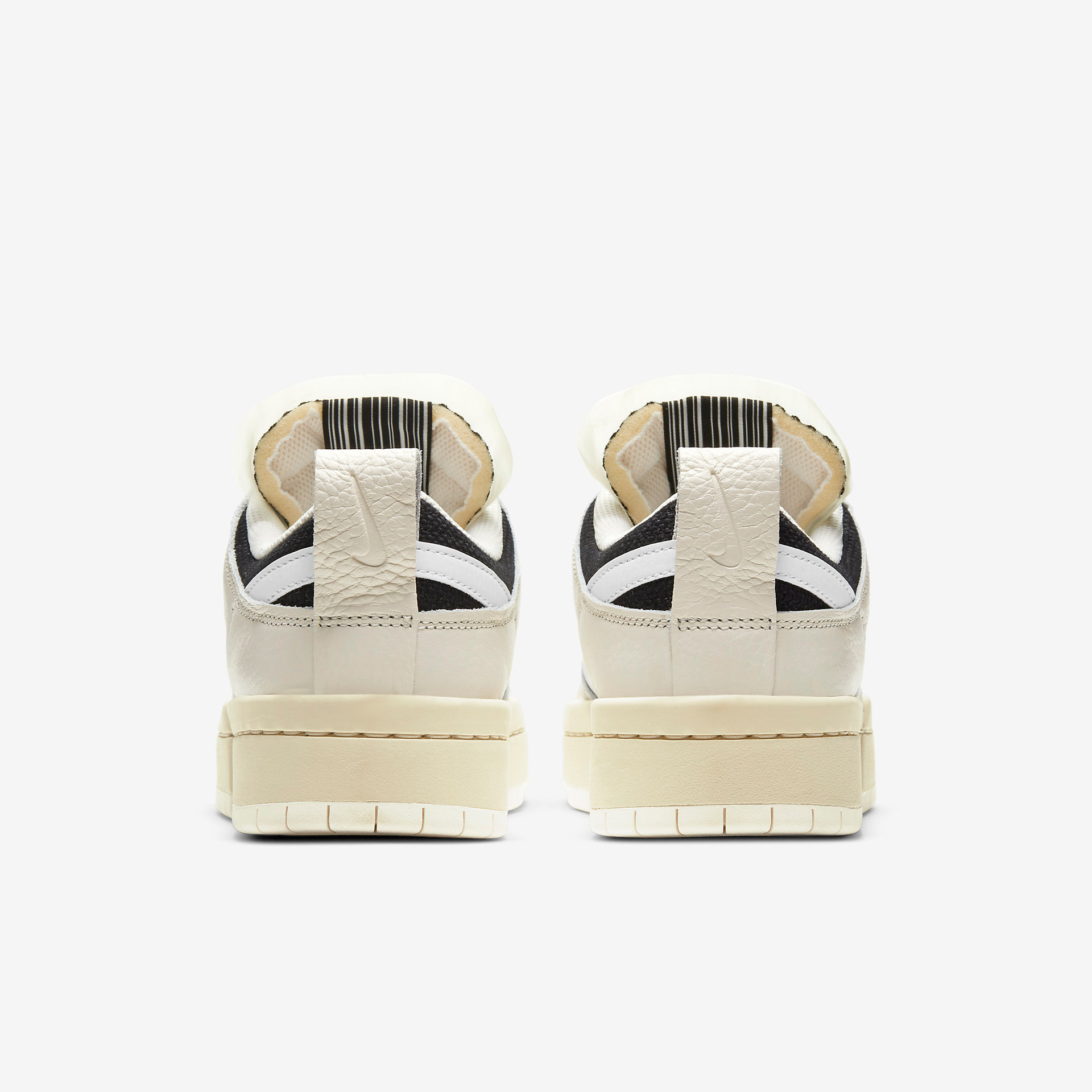 SB Dunk Low Disrupt Pale ivory Black