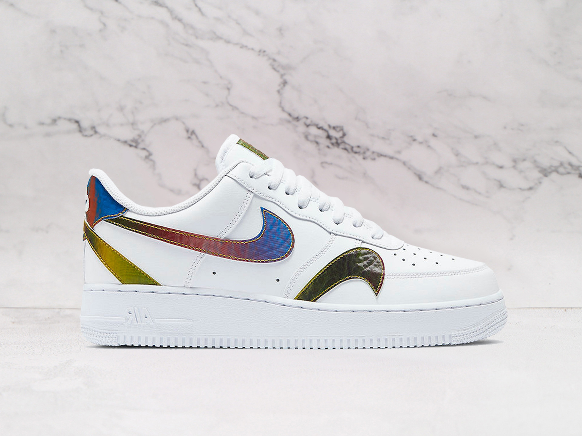 Nike Air Force 1 Low Misplaced Swooshes – White Leather Sneaker with Reflective Silver Swooshes and Air Cushioning