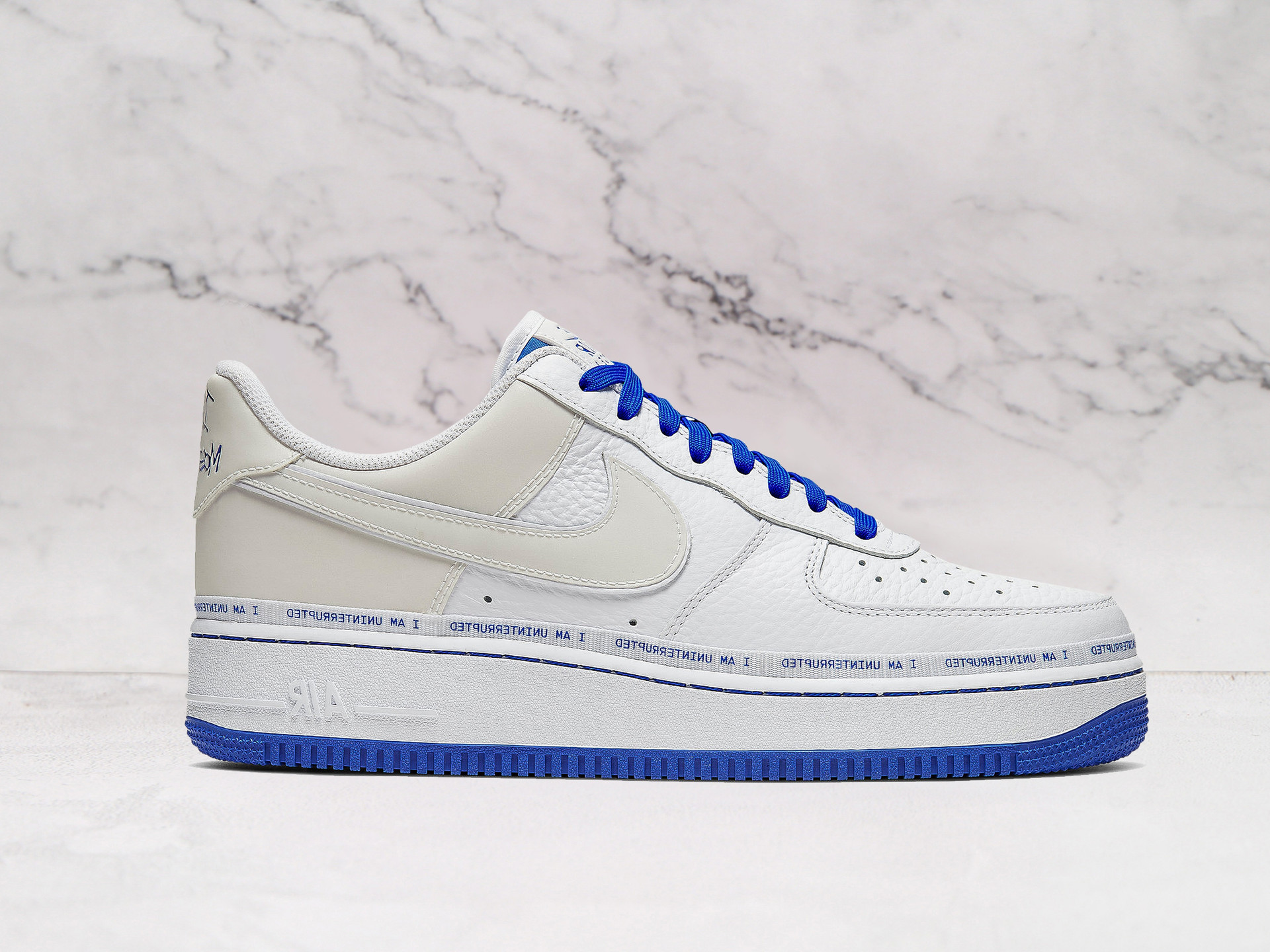 Nike Air Force 1 Low 'Uninterrupted – More Than an Athlete' – White Leather Upper with Game Royal Accents