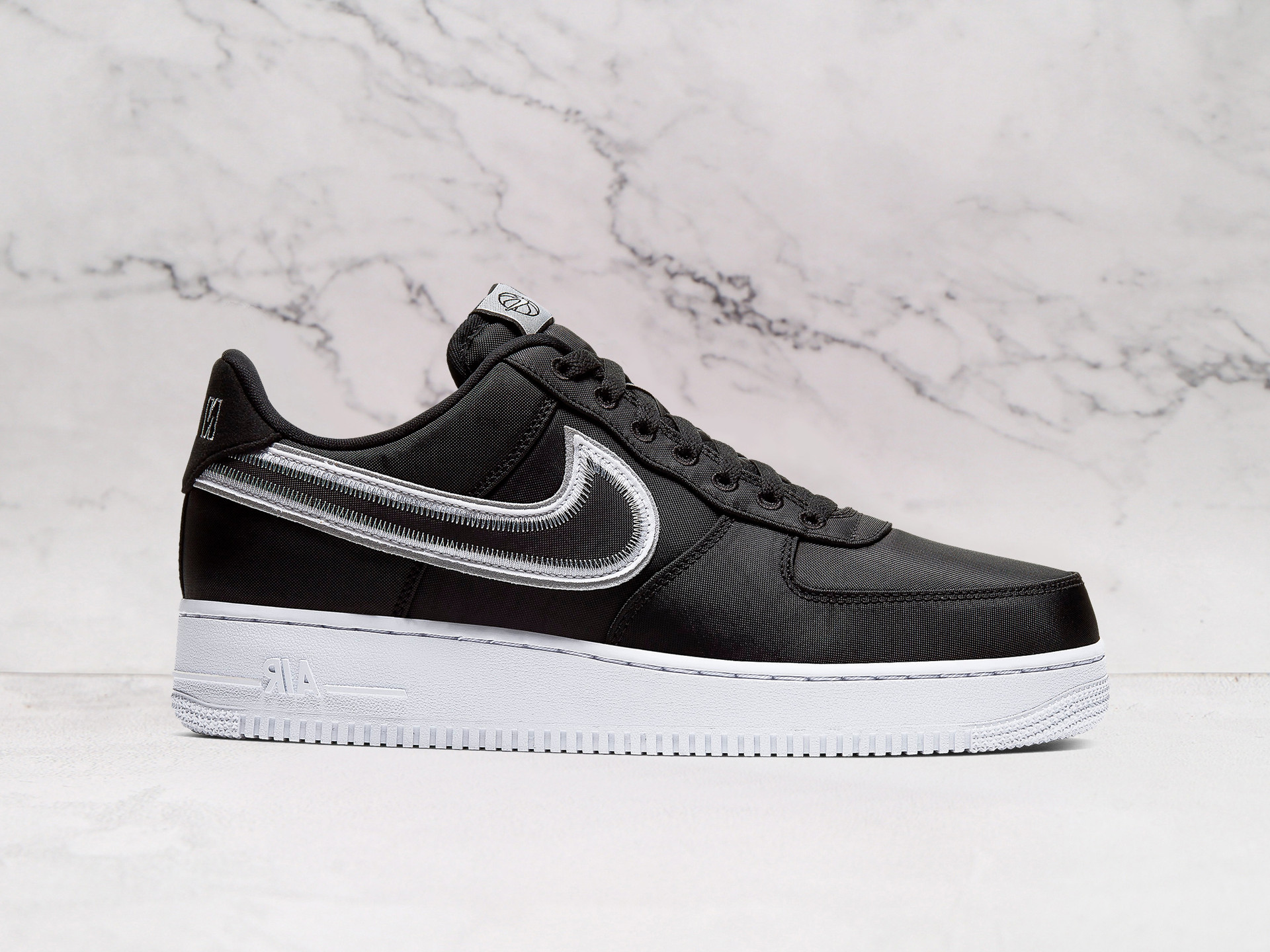 Nike Air Force 1 Low 'Reverse Stitch' Black – Black Leather Upper with White Swoosh and Reverse Stitching Details