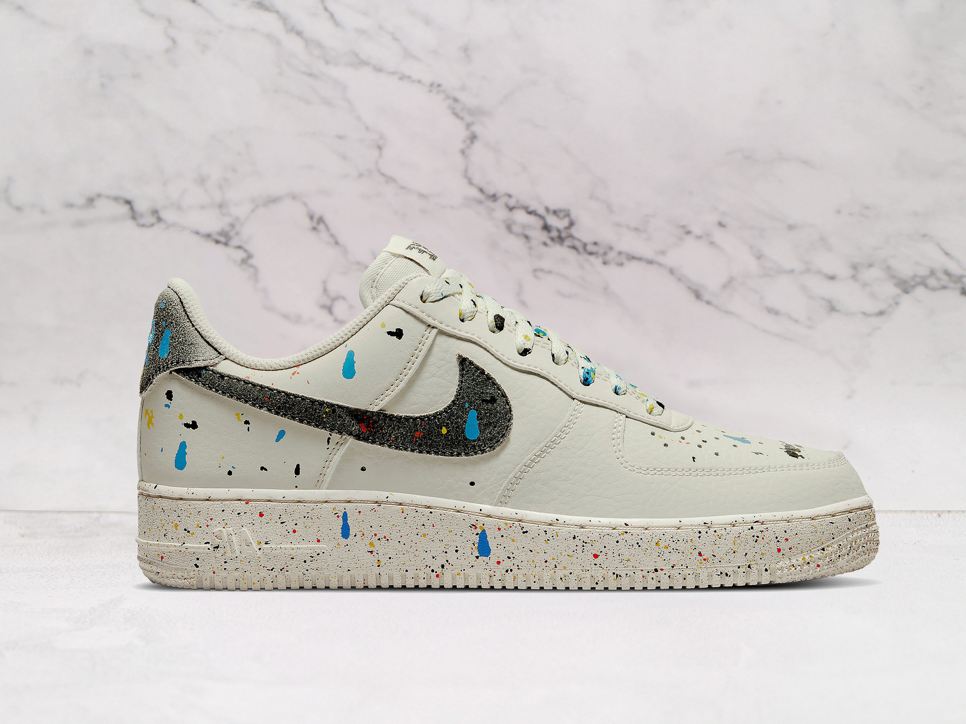 Nike Air Force 1 LV8 Paint Splatter – White Leather with Colorful Accents