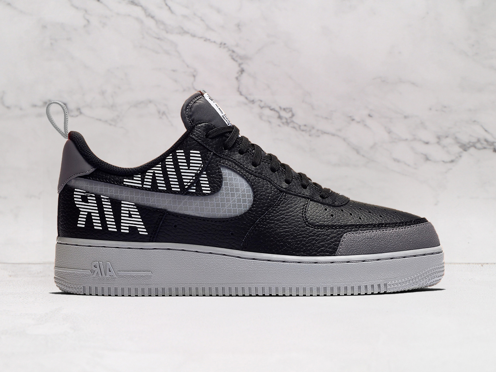 Nike Air Force 1 Low 'Under Construction' – Black Leather Upper with Semi-Translucent Swoosh and Reflective Accents