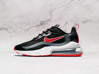 Nike Air Max 270 React Black Bright Crimson side profile featuring a sleek black upper with bold bright crimson accents, a lightweight React foam midsole, and an oversized Air Max heel unit for responsive cushioning
