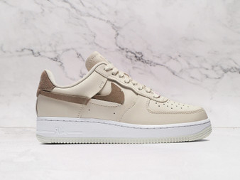 Nike Air Force 1 LXX 'Vandalized' – Light Orewood Brown Leather Upper with Fragmented Swoosh in Olive Grey and Light Arctic Pink
