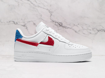 Air Force 1 LXX Vandalized – White Leather with Snakeskin Swooshes
