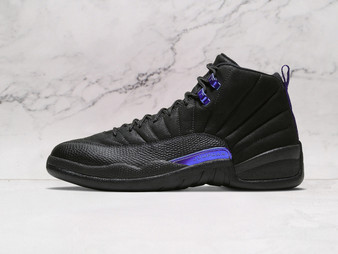 Side of Air Jordan 12 Retro Dark Concord with purple kicks