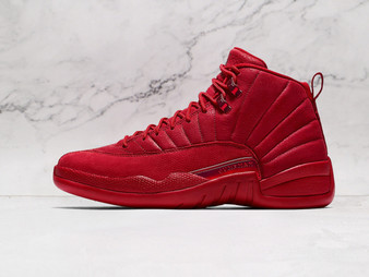 Side view of rare Air Jordan 12 Retro 'Gym Red' with bold red leather upper and black Jumpman