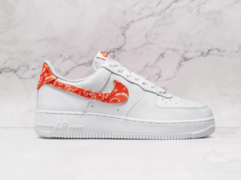 Nike Air Force 1 Low Orange Paisley DJ9942-102 with orange Swoosh and white leather.