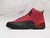 Side of Air Jordan 12 Retro Reverse Flu Game with red suede.