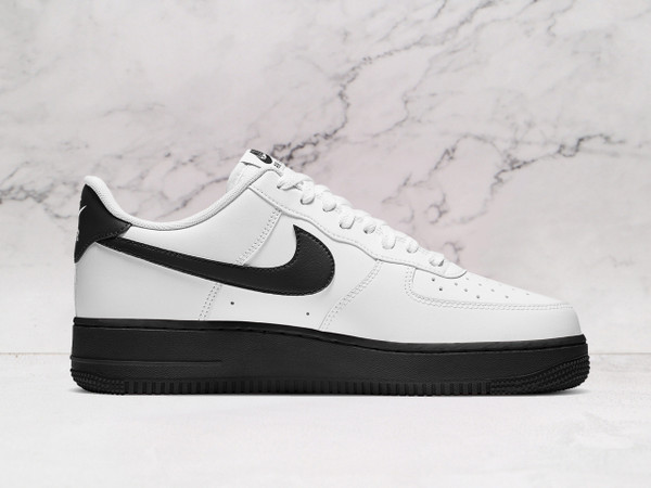 White Nike Air Force 1 Low medial view with Black heel tab and perforated toe