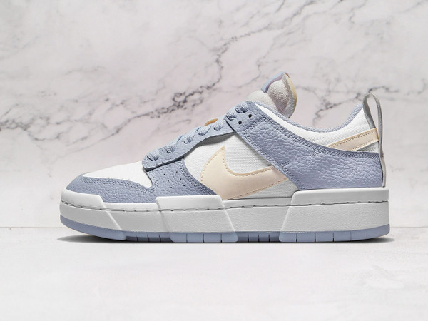 Nike SB Dunk Low Disrupt ‘Summit White Ghost’ – Leather and suede sneaker in Summit White and Desert Sand