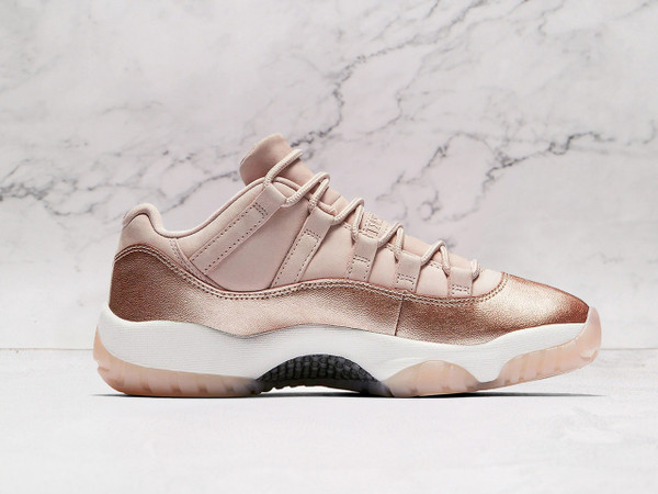 Medial view of Air Jordan 11 Retro 'Rose Gold' heel with Pink-tinted translucent outsole and Jumpman logo in Metallic Red Bronze