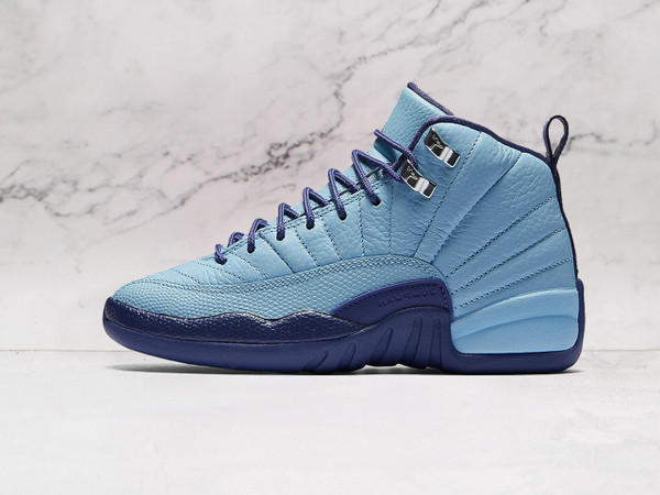 Side view of Air Jordan 12 Retro 'Hornets' in Deep Royal Blue leather.