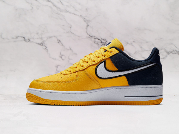 Yellow Nike Air Force 1 Low Amarillo medial view with white Swoosh