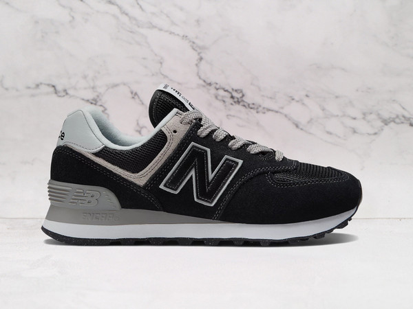 New Balance 574 Core Black sneaker featuring a suede and mesh upper with ENCAP midsole cushioning for all-day comfort New Balance 574 Core Black sneaker featuring a suede and mesh upper with ENCAP midsole cushioning for all-day comfort