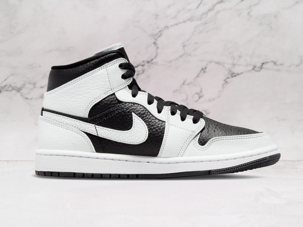 Jordan 1 Mid – Black & White Split Design