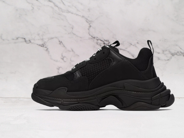 Balenciaga Triple S sneakers in black featuring chunky sole and premium materials for superior comfort and style