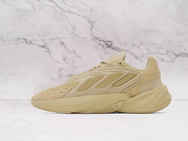 Adidas Ozelia – Comfortable Beige Mesh Upper & Iconic Stripes