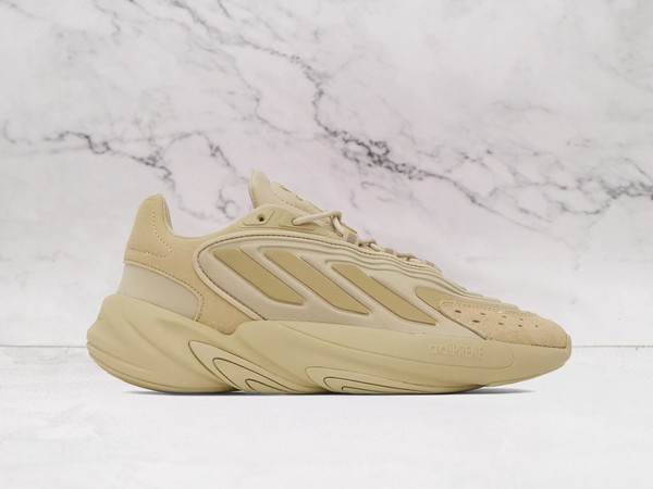 ADIDAS Beige Ozelia Sneakers – Sleek, Sculpted Design
