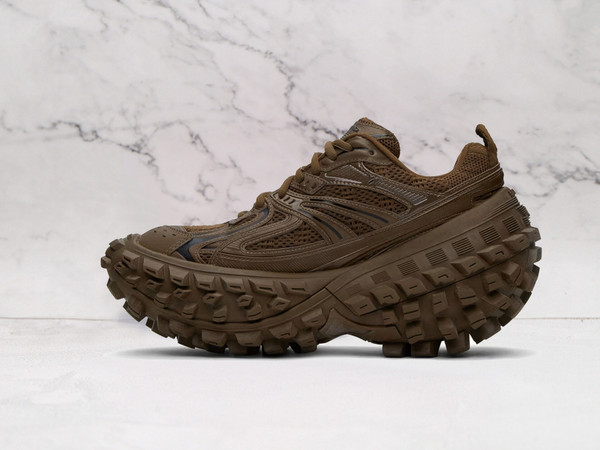 Balenciaga platform sneakers in brown featuring oversized, sculpted sole for a high-fashion streetwear look