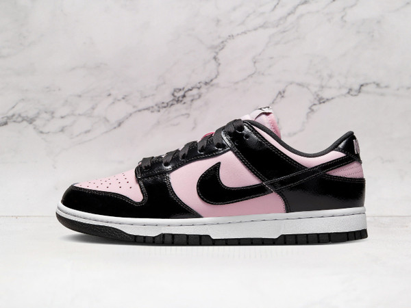 Nike Dunk Low Pink Foam Black with black Swoosh.