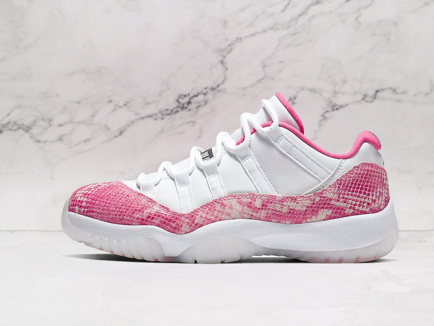 Side view of Air Jordan 11 Retro Low 'Pink Snakeskin' with White leather upper and Pink snakeskin overlay