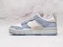 Nike SB Dunk Low Disrupt ‘Summit White Ghost’ – Leather and suede sneaker in Summit White and Desert Sand