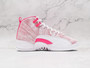 Air Jordan 12 Retro 'Arctic Pink' – Medial view Arctic Punch Suede Overlays and Hyper Pink Accents