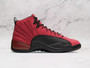 Medial view of Air Jordan 12 Retro Reverse Flu Game with black mudguard.