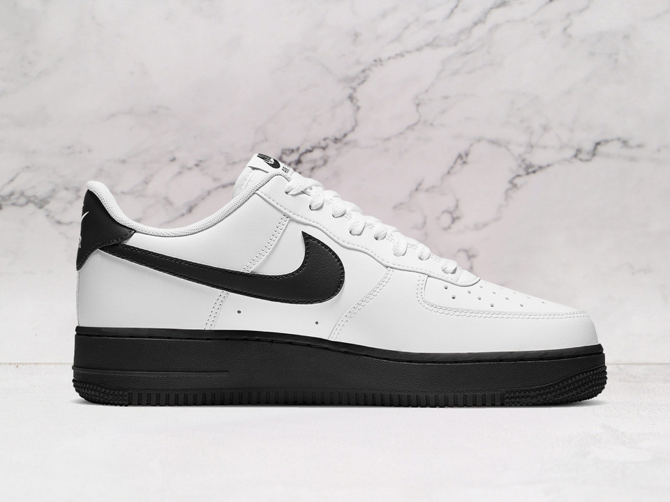 White Nike Air Force 1 Low medial view with Black heel tab and perforated toe