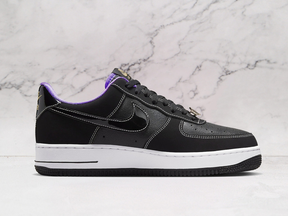 Black Nike Air Force 1 Low medial view with Purple liner and White stitching Black Nike Air Force 1 Low medial view with Purple liner and White stitching