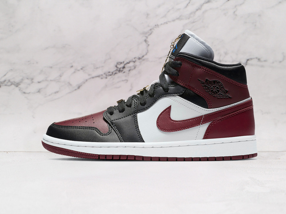 Air Jordan 1 Mid SE 'Black Dark Beetroot' – Black and Dark Beetroot Upper with Gold Lace Pendants Air Jordan 1 Mid SE 'Black Dark Beetroot' – Black and Dark Beetroot Upper with Gold Lace Pendants