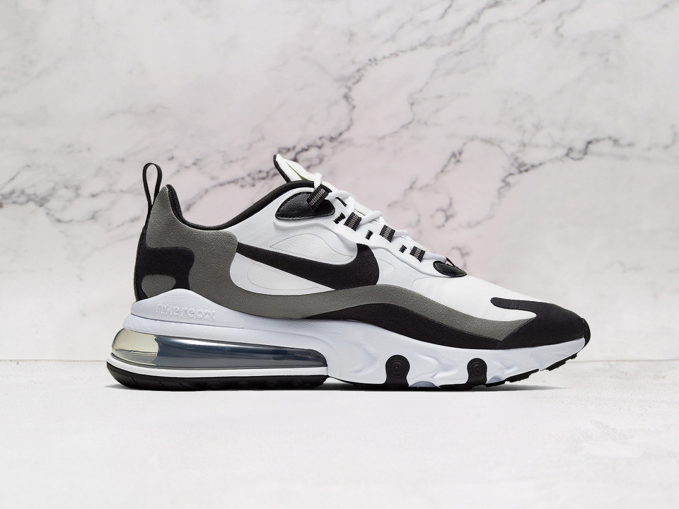Nike Air Max 270 React White Black Metallic Pewter medial angle showcasing smooth no-sew overlays, breathable mesh construction, and a durable rubber outsole for all-day wearability Nike Air Max 270 React White Black Metallic Pewter medial angle showcasing smooth no-sew overlays, breathable mesh construction, and a durable rubber outsole for all-day wearability