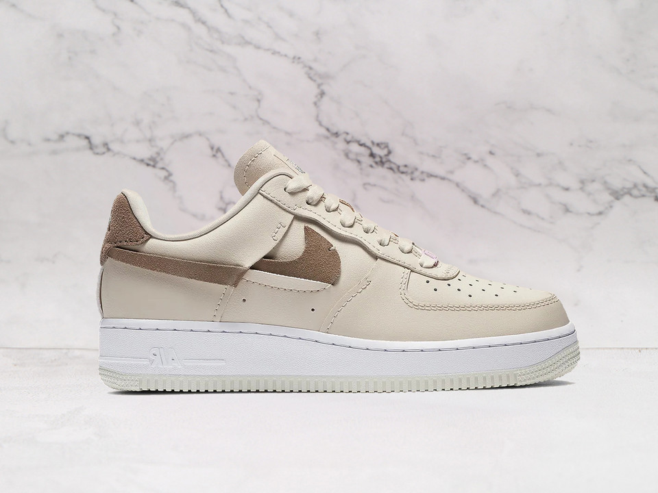 Nike Air Force 1 LXX 'Vandalized' – Light Orewood Brown Leather Upper with Fragmented Swoosh in Olive Grey and Light Arctic Pink Nike Air Force 1 LXX 'Vandalized' – Light Orewood Brown Leather Upper with Fragmented Swoosh in Olive Grey and Light Arctic Pink