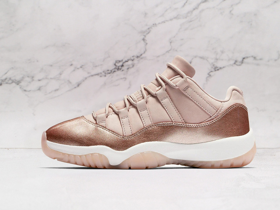 Side view of Air Jordan 11 Retro 'Rose Gold' showcasing Metallic Red Bronze patent leather and Sail upper on a white background