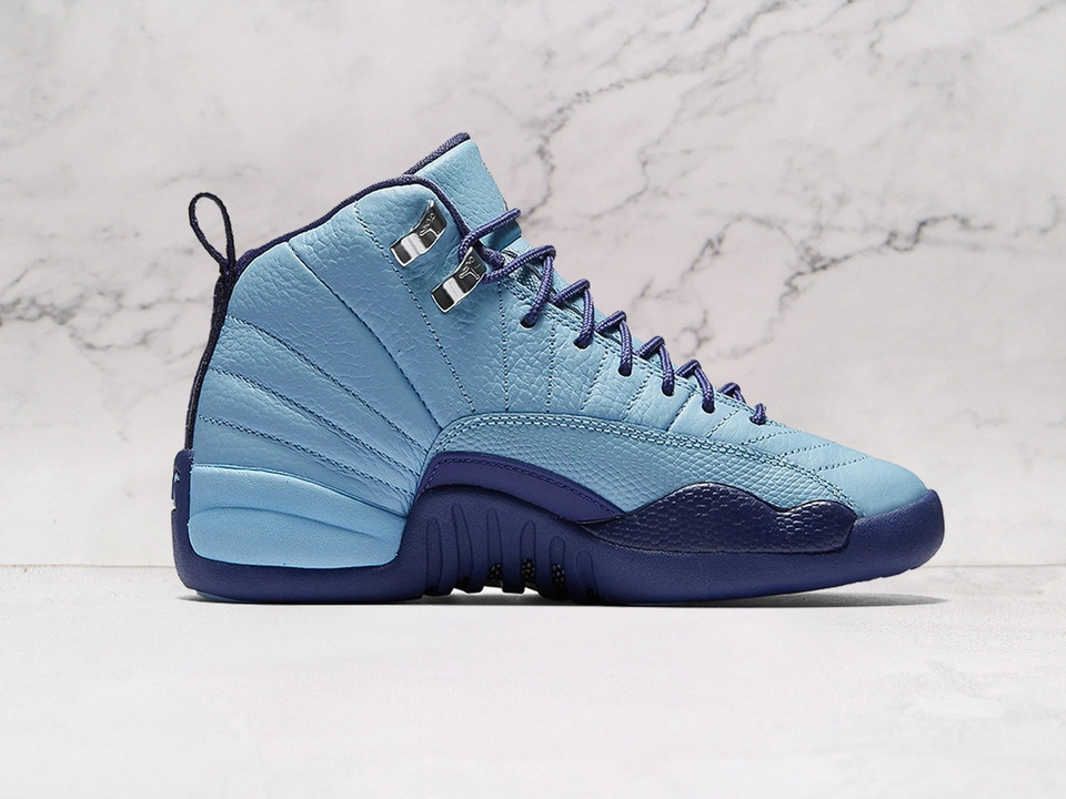 Medial shot of Air Jordan 12 Retro 'Hornets' with Purple Dust outsole.