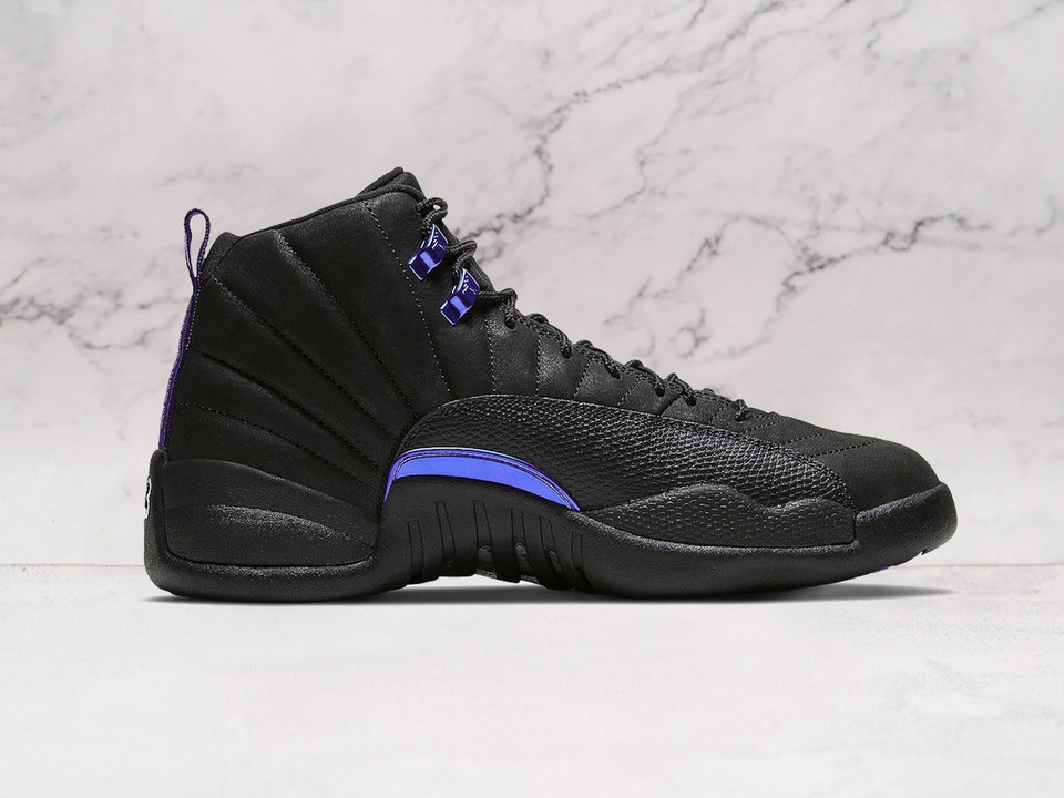 Medial angle of Air Jordan 12 Retro Dark Concord with black sole