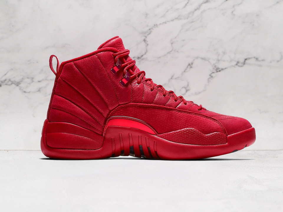 Medial view of Air Jordan 12 Retro 'Gym Red' with full red leather and white midsole