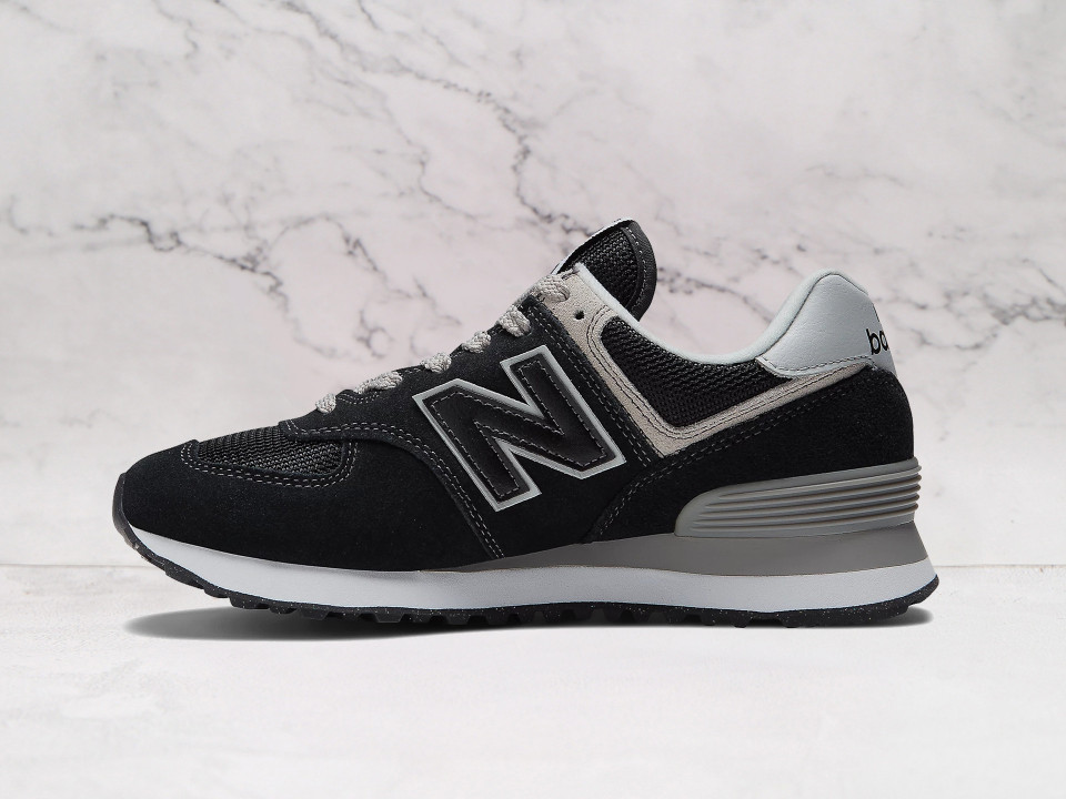 New Balance 574 Core Black retro running shoe with durable rubber outsole and classic ‘N’ logo branding New Balance 574 Core Black retro running shoe with durable rubber outsole and classic ‘N’ logo branding